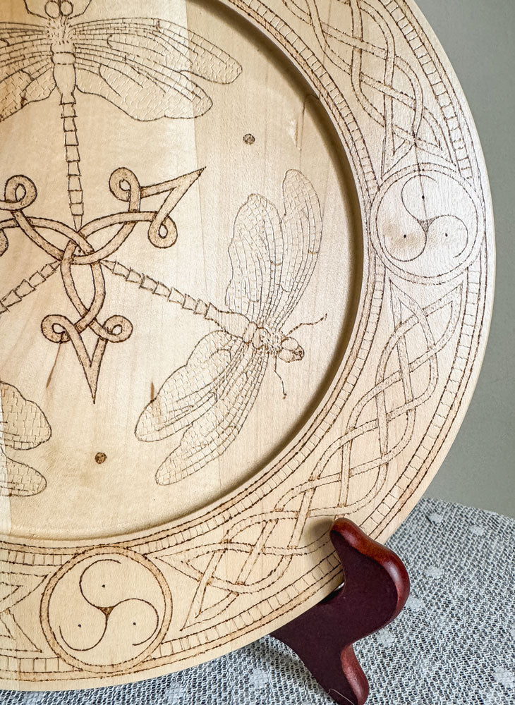 Celtic-inspired woodburned decorative plate featuring a dragonfly trio