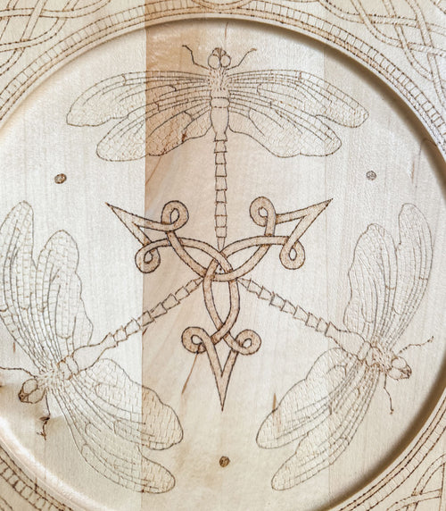 Celtic-inspired woodburned decorative plate featuring a dragonfly trio