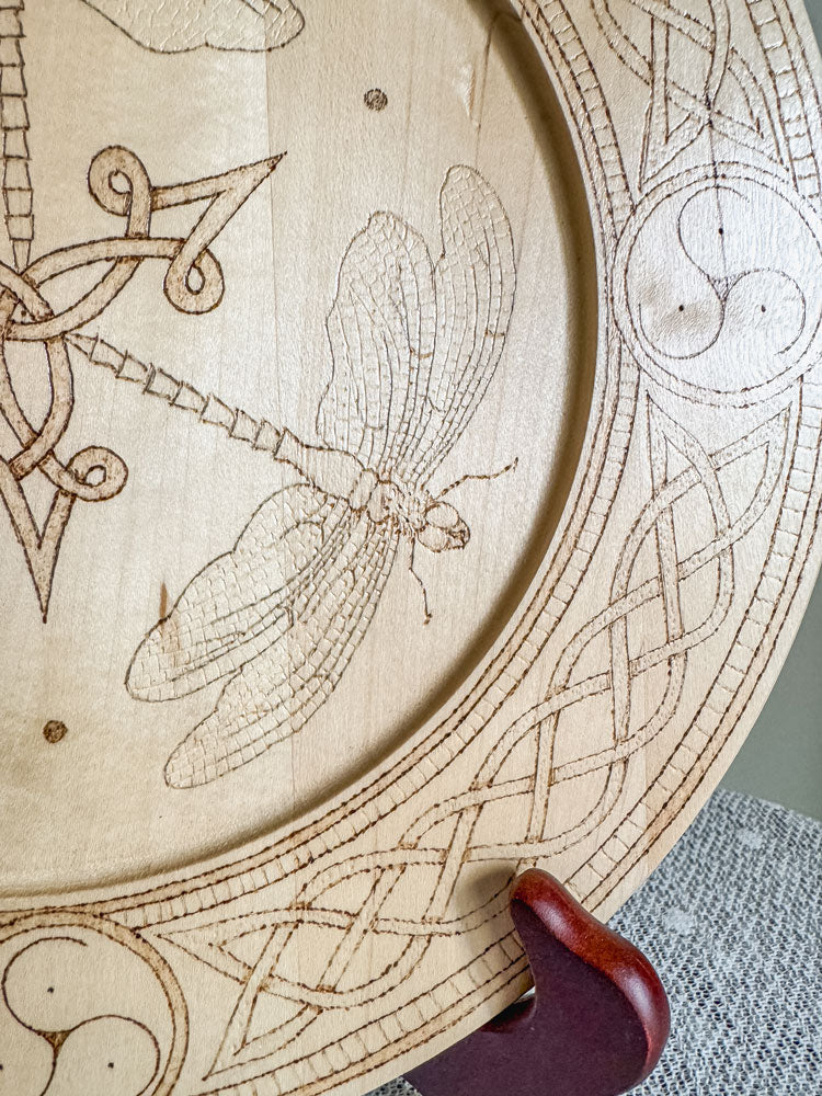 Celtic-inspired woodburned decorative plate featuring a dragonfly trio