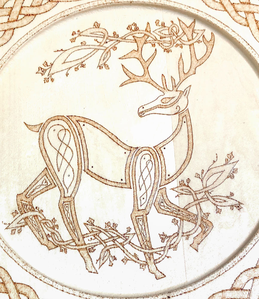 Celtic knot deer on a woodburned decorative plate