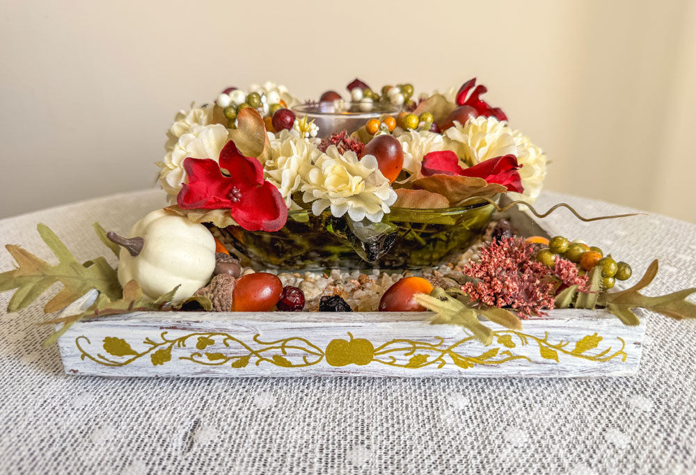 Autumn-themed candleholder with upcycled green glass apple candy dish