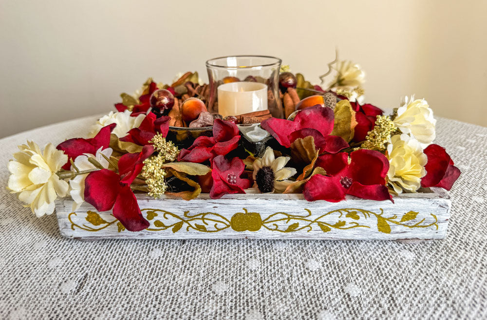 Cinnamon and apple-themed candleholder with upcycled green glass apple candy dish