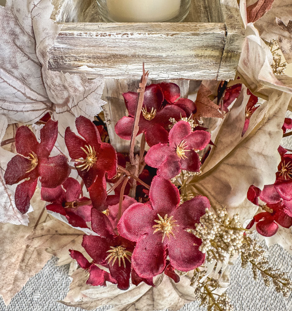 Frosty autumn handcrafted candleholder with artificial burgundy flowers