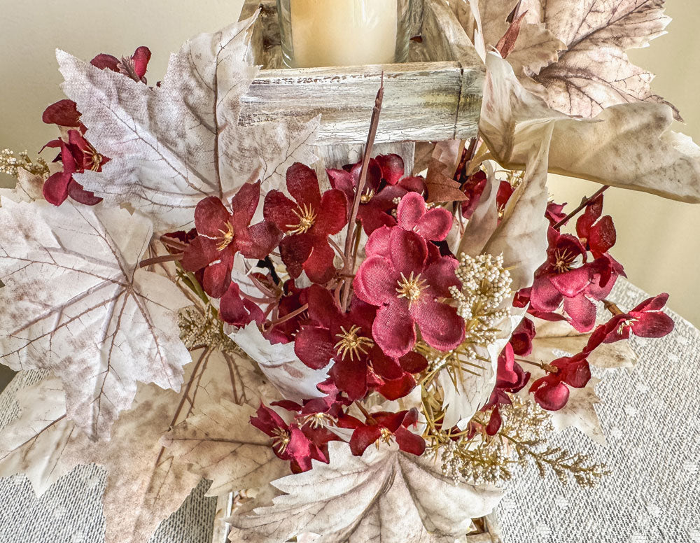 Frosty autumn handcrafted candleholder with artificial burgundy flowers
