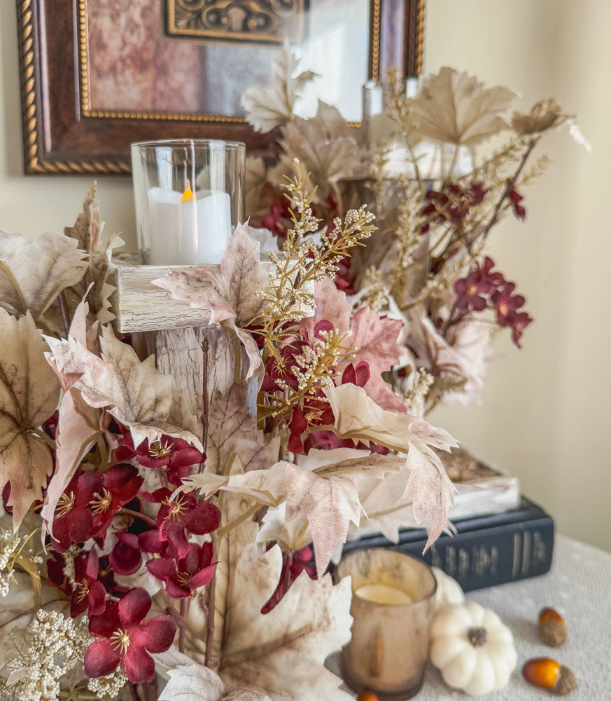 Frosty autumn handcrafted candleholder with artificial burgundy flowers