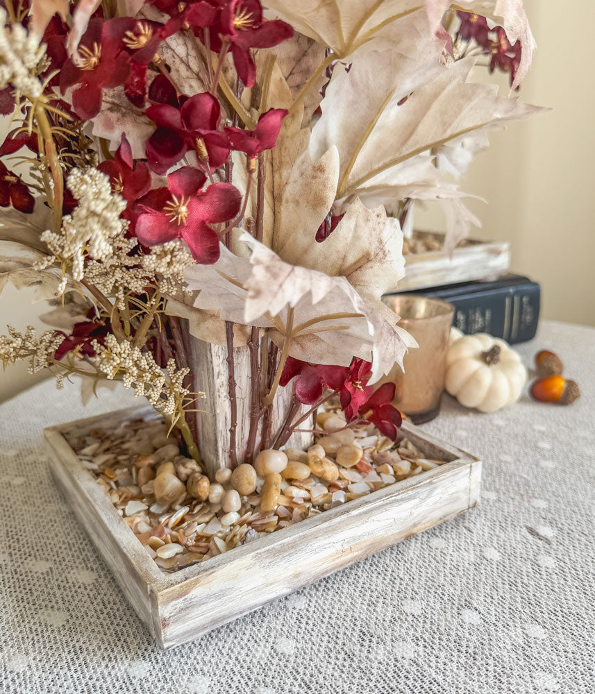 Frosty autumn handcrafted candleholder with artificial burgundy flowers