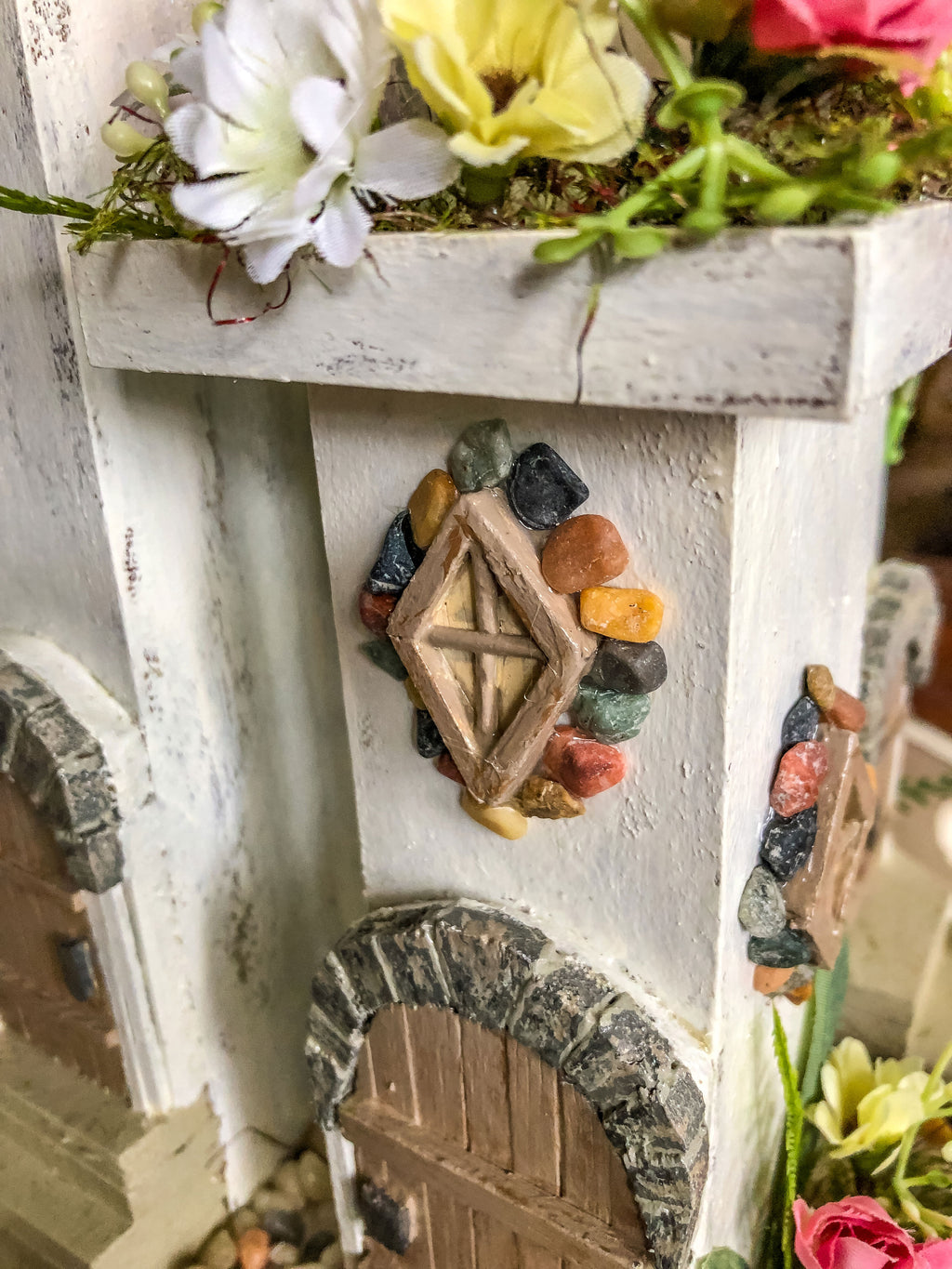 Whimsical wood candleholder with a fairy tower trio and faux florals