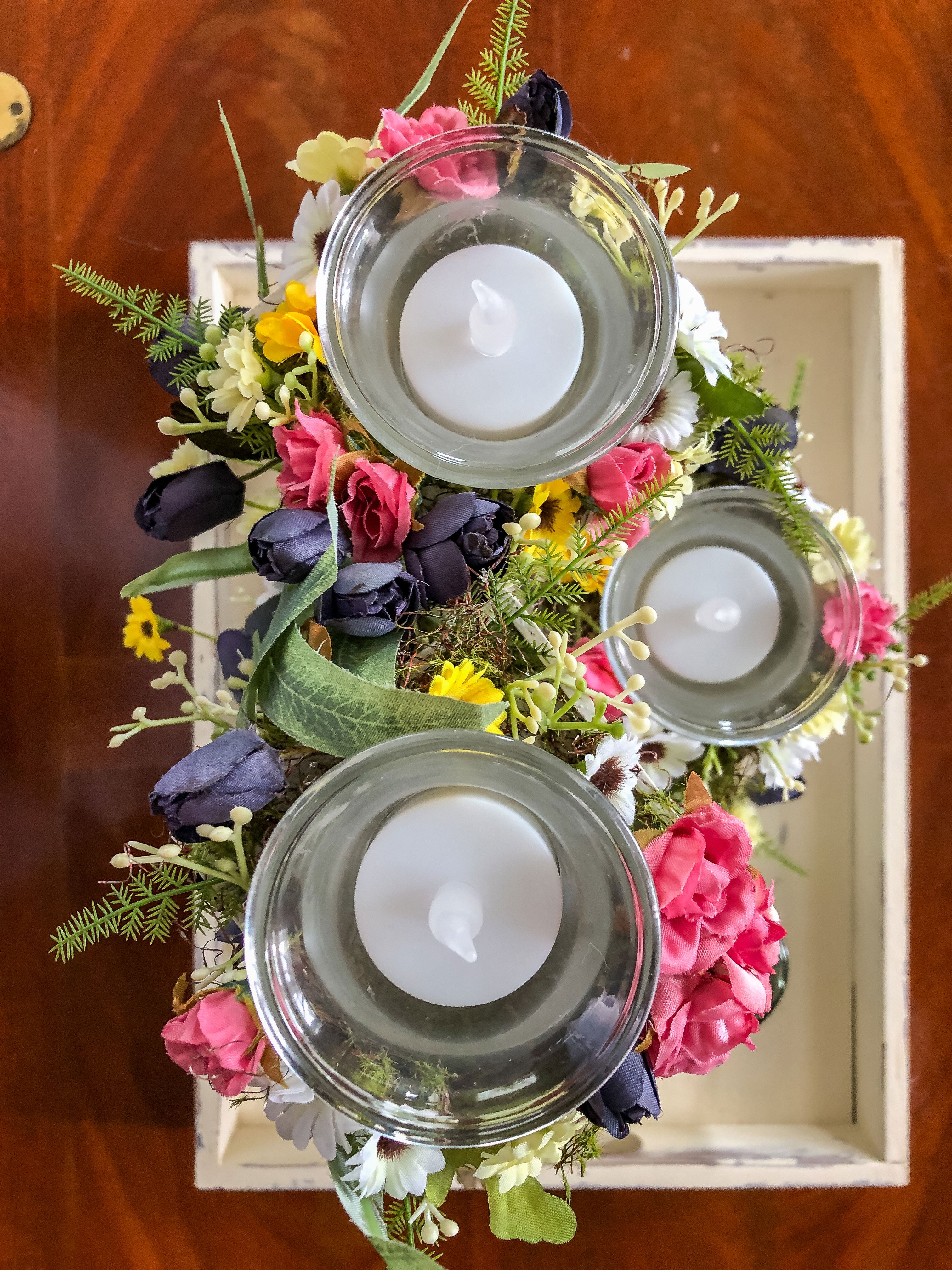 Whimsical wood candleholder with a fairy tower trio and faux florals