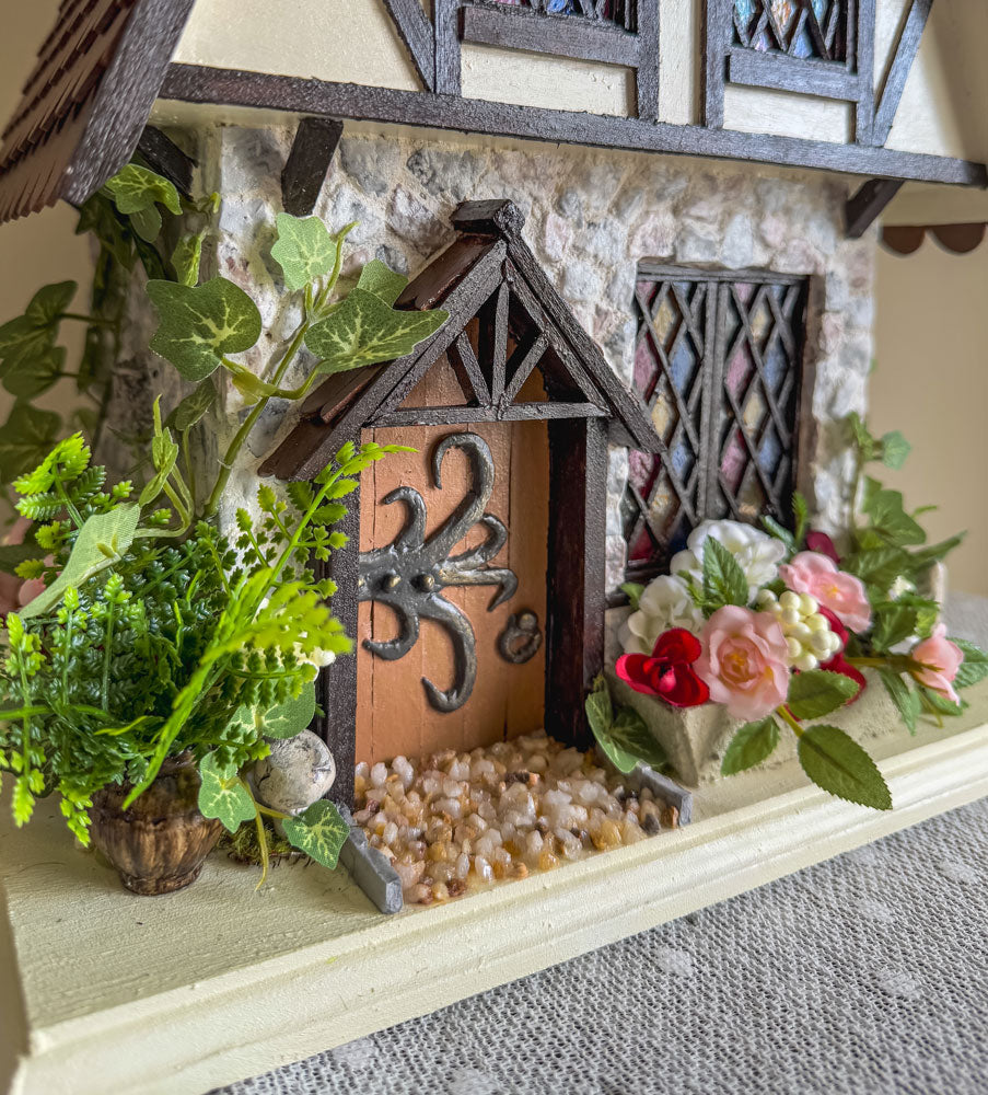 Handcrafted half-timbered wood and stone fairy house