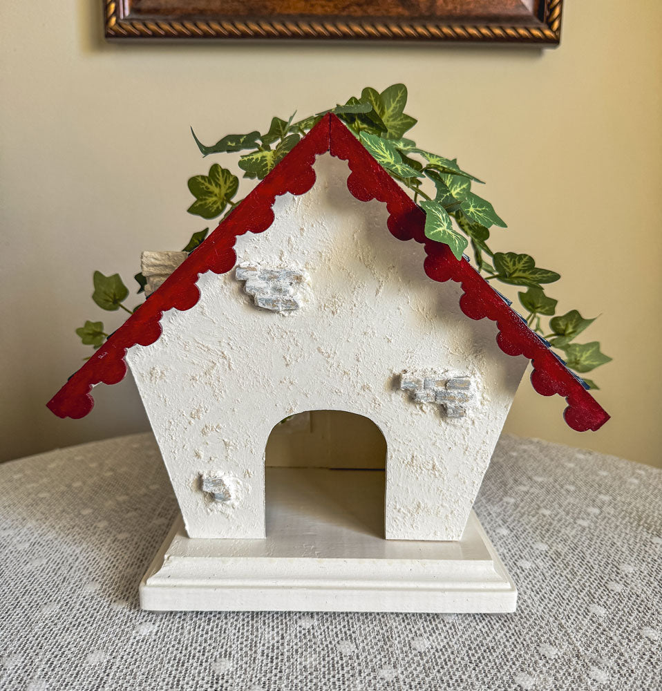 Red, white, and blue woodland fairy cottage with scalloped roof trim