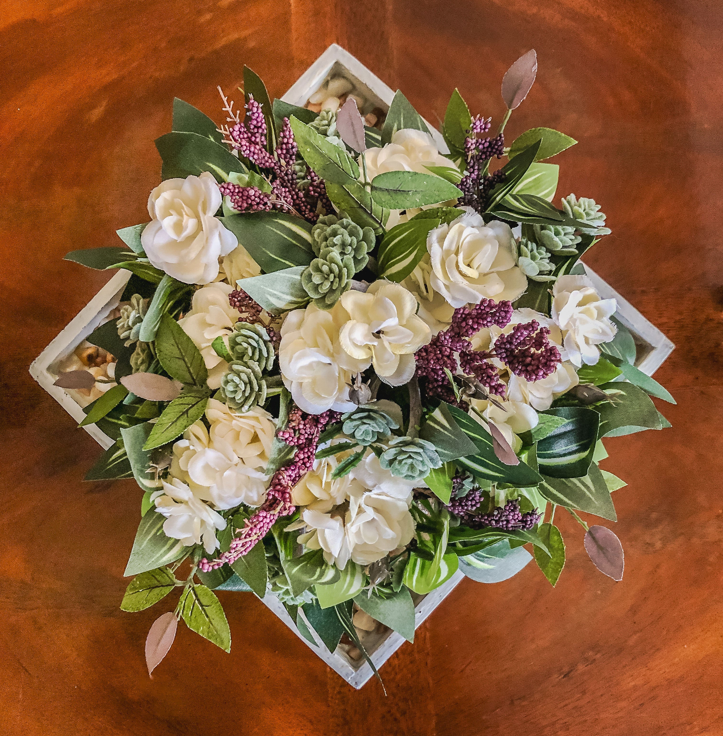 Fairy-inspired faux floral arrangement with faux roses and purple berries