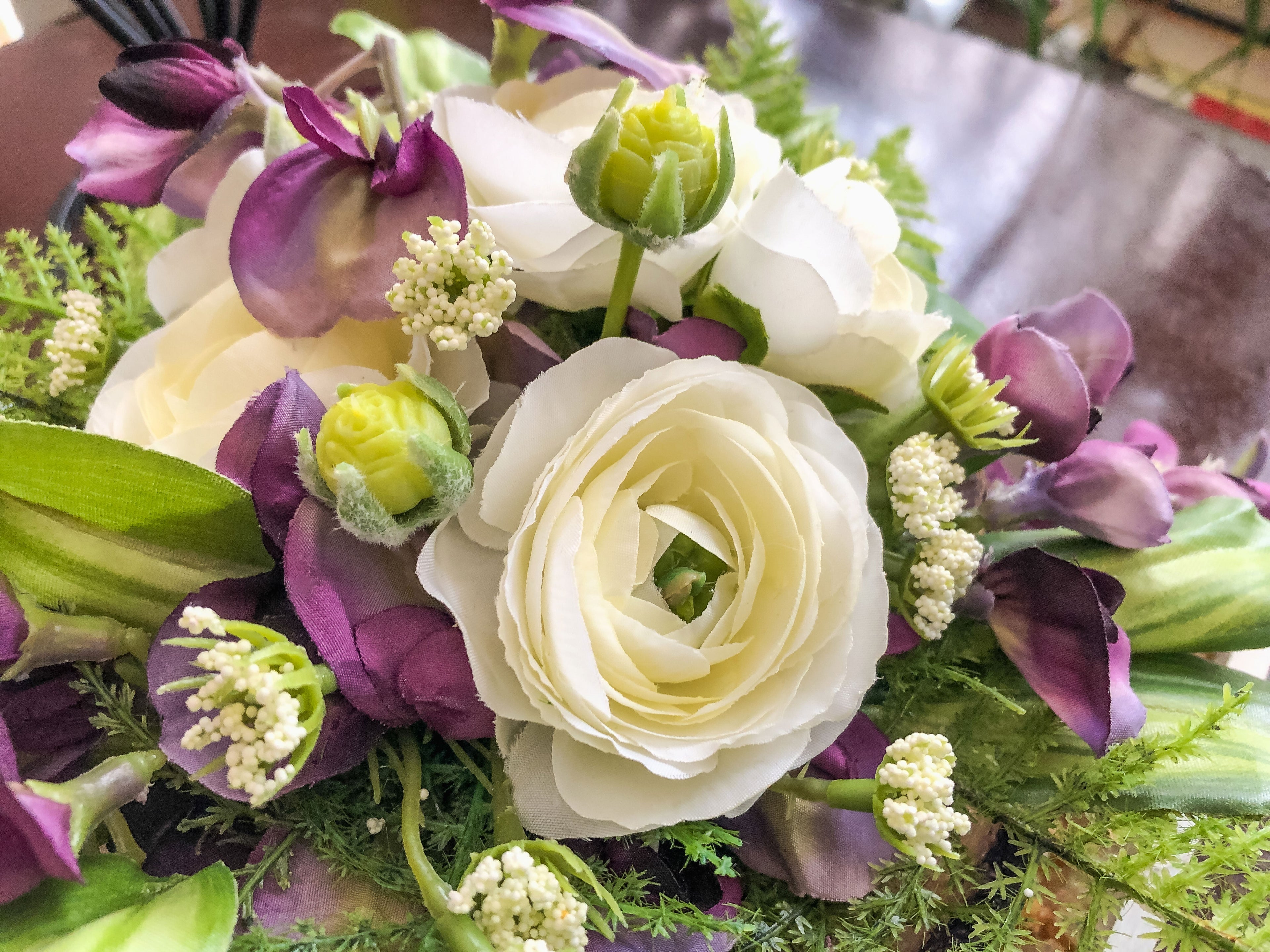 Fairy-inspired faux floral arrangement with purple wisteria