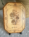 Small wood plaque with dahlias and the word grace on a stand 