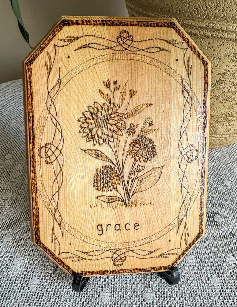 Small wood plaque with dahlias and the word grace on a stand 