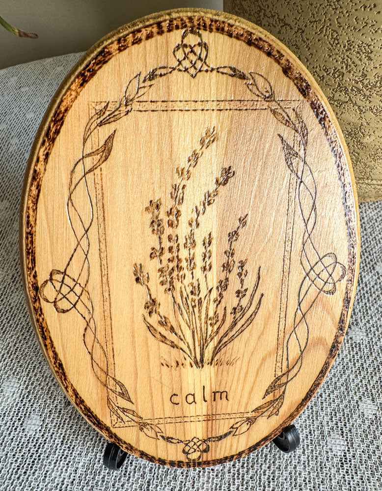 Small wood plaque with lavender and the word calm on a stand